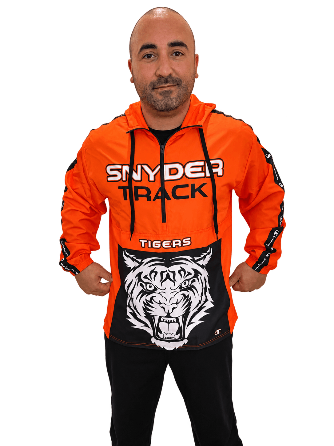 Coach Robert Arena wearing his orange Snyder Track jacket